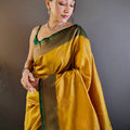 Elegant Yellow Silk Saree With Gold Zari Motifs