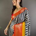 Heritage Glow Striped Zari Saree