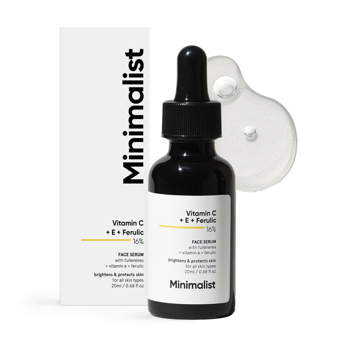 Black face serum bottle with dropper and packaging labeled 'Minimalist' on a white background