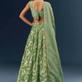 Spa Green Banarasi Silk Bridesmaid Lehenga With Heavy Hand Embroidery