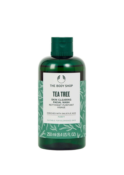 The Body Shop Tea Tree Skin Clearing Facial Wash in a green bottle with white and black labeling, containing 250 ml of product.