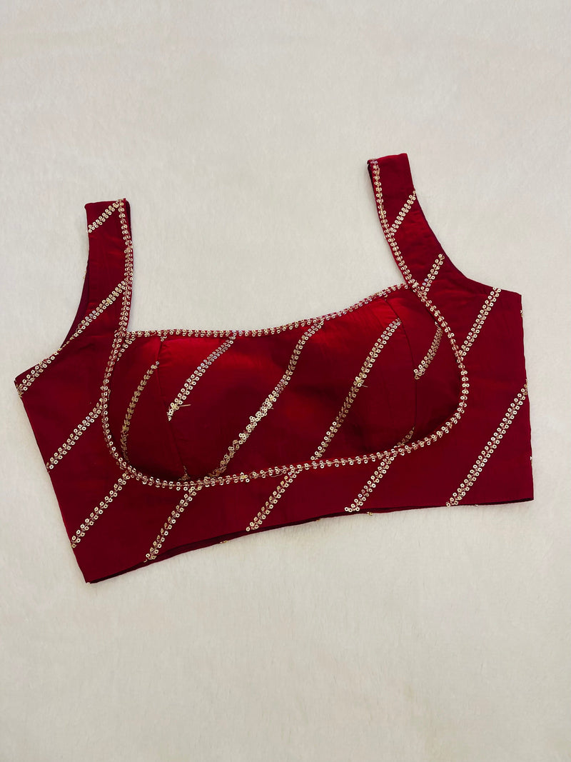 Divine maroon sleeveless blouse