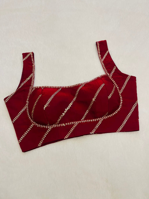 Divine maroon sleeveless blouse