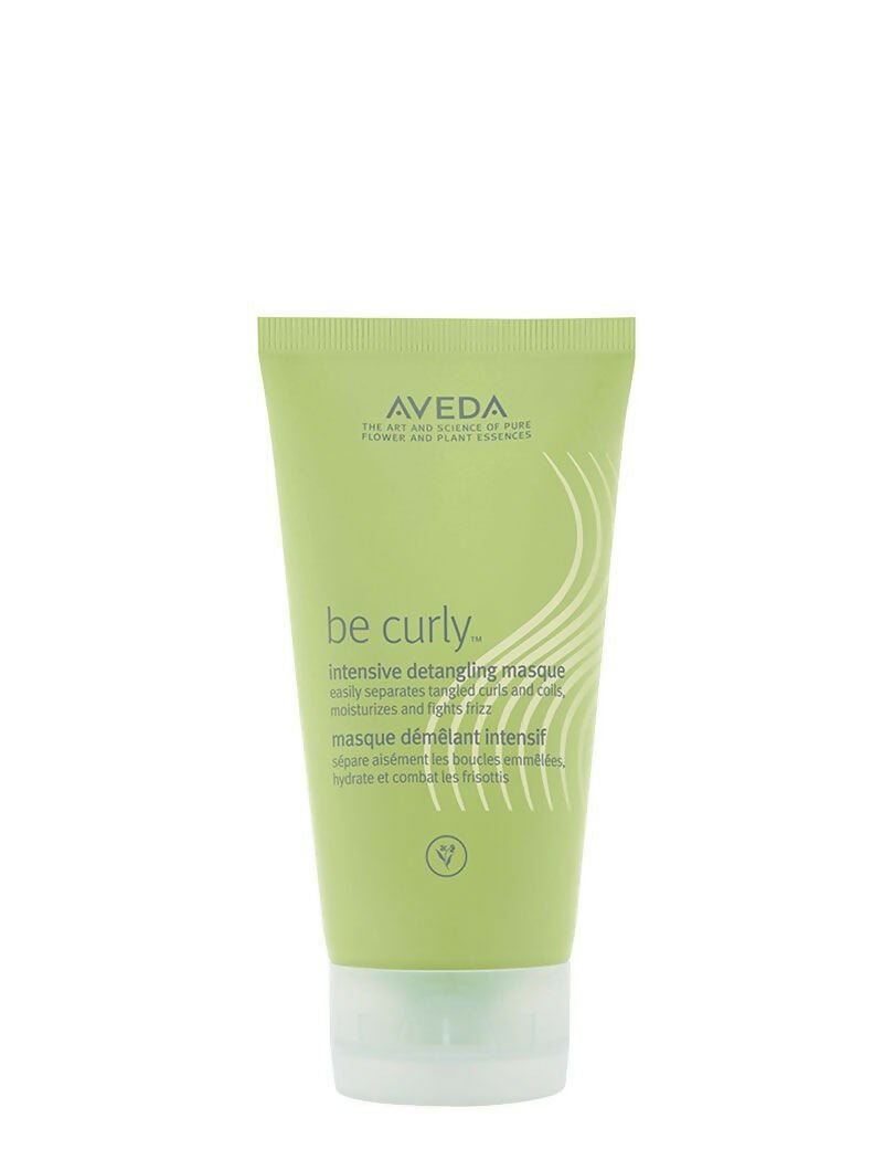 Aveda 'be curly' intensive detangling masque tube on a white background