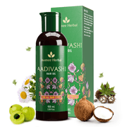 Avimee Herbal Aadvishi hair oil bottle and packaging with natural elements on a white background