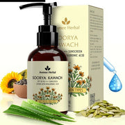 Avmee Herbal Soorya Kawach sunscreen lotion with packaging, sunflower, aloe vera leaves, and seeds on a white background.