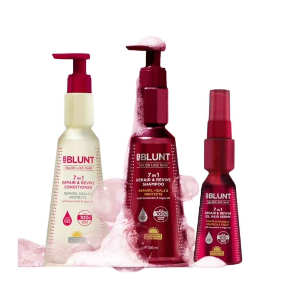 BBlunt hair care product set including shampoo, conditioner, and serum on a white background