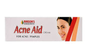 Bakson's Acne Aid cream packaging with a woman's face on a white background