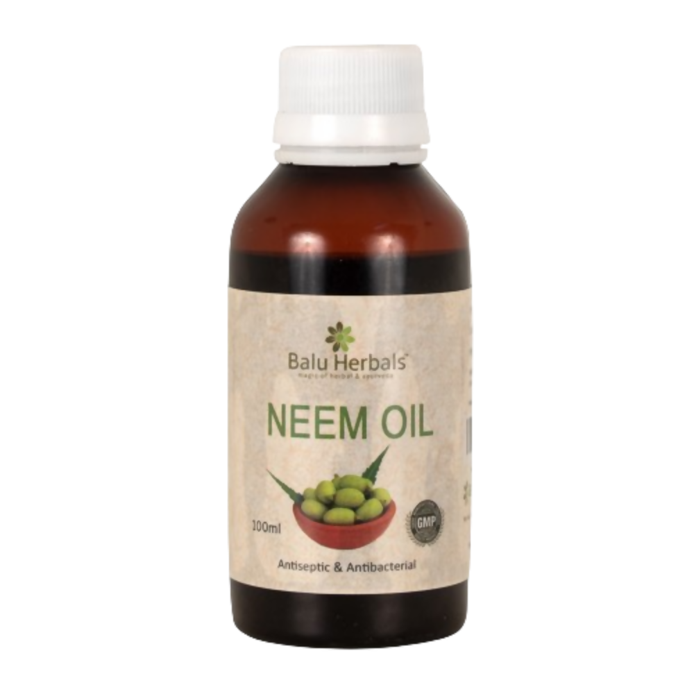 Bottle of Balu Herbals Neem Oil on a white background