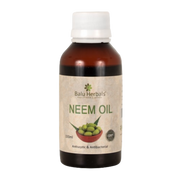 Bottle of Balu Herbals Neem Oil on a white background
