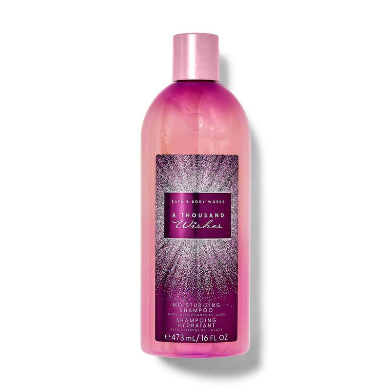 Pink shampoo bottle with purple label on a white background
