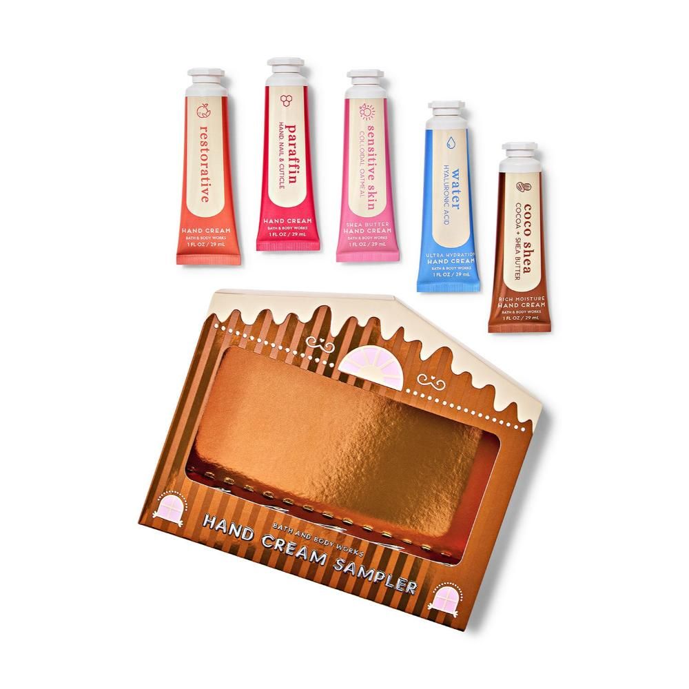Hand cream sampler set with various scents in small tubes on a white background