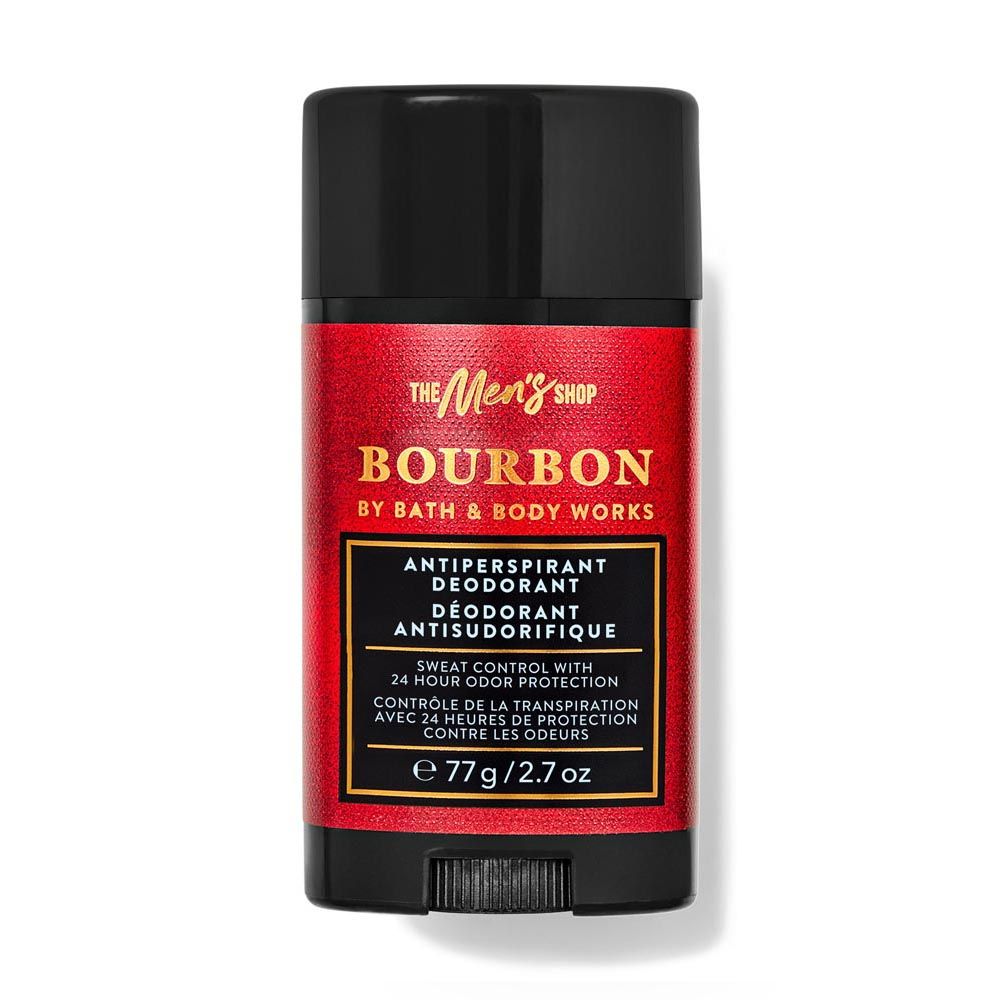 Deodorant stick with red label and black cap on white background