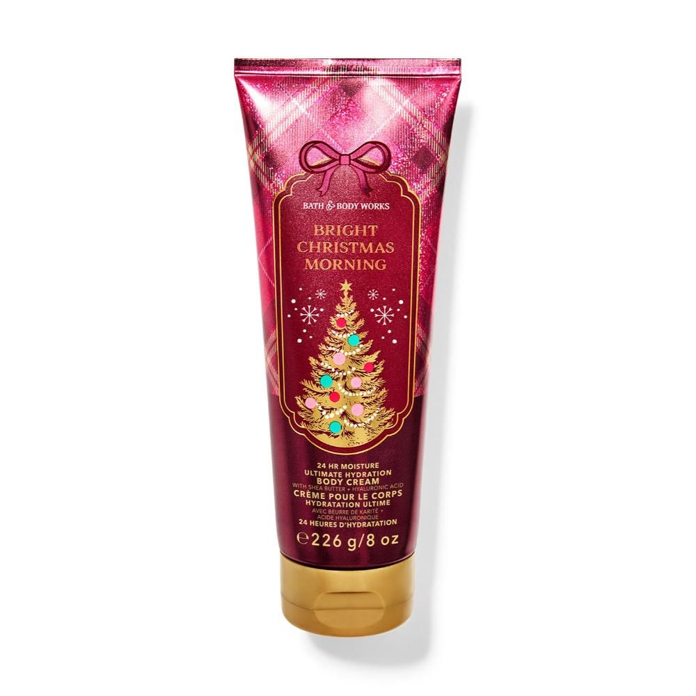 Tube of Bath & Body Works lotion with Christmas design on a white background