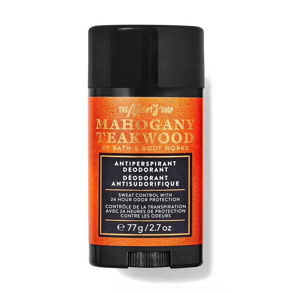 Deodorant stick with orange label on a white background