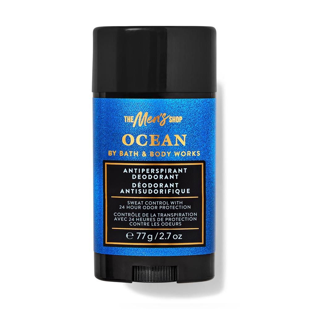 Deodorant stick with blue label and black cap on white background