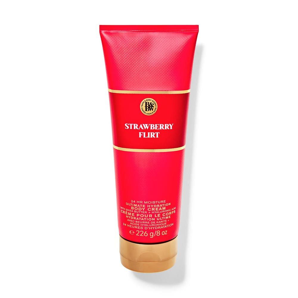 Red body cream tube labeled 'Strawberry Flirt' on a white background