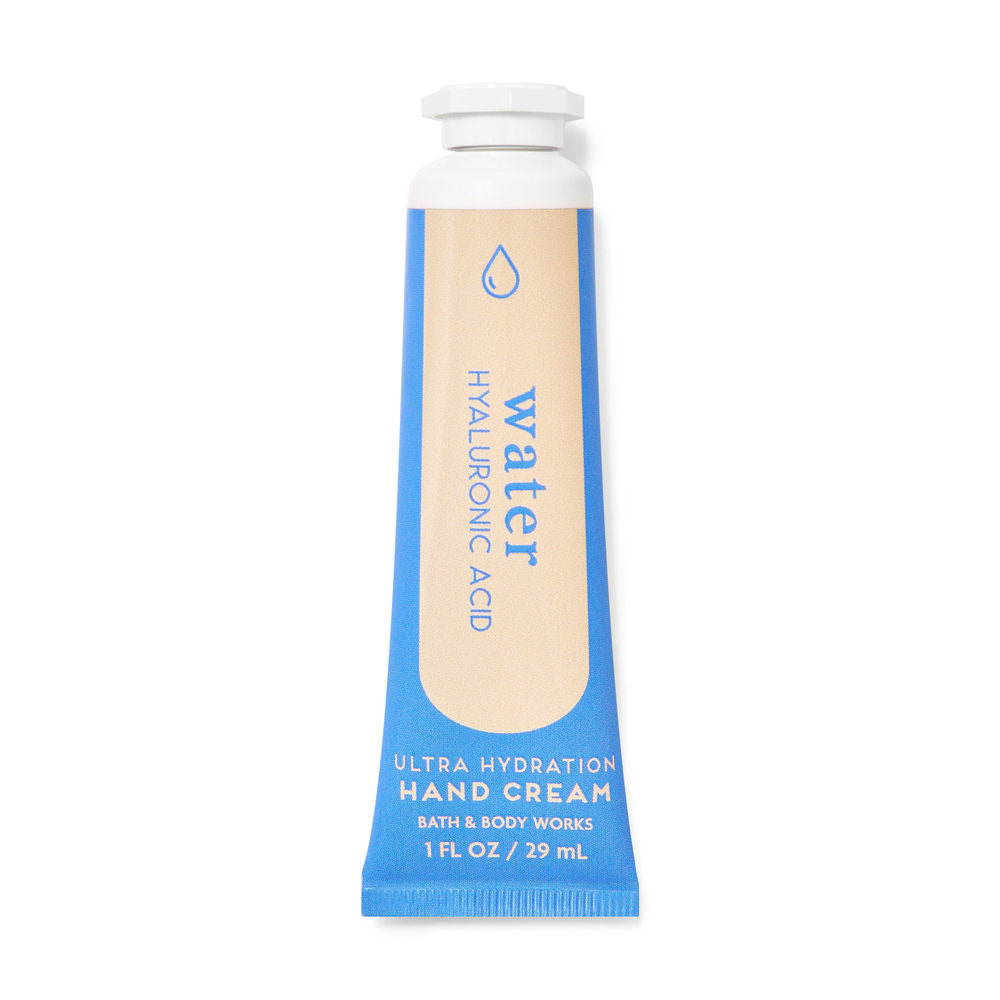 Hand cream tube with blue and beige design on a white background