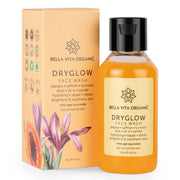 Image of Bella Vita Organic Dryglow Face Wash, with product packaging and bottle displayed. The packaging is predominantly orange and white with floral motifs, and the bottle is transparent with a black cap.