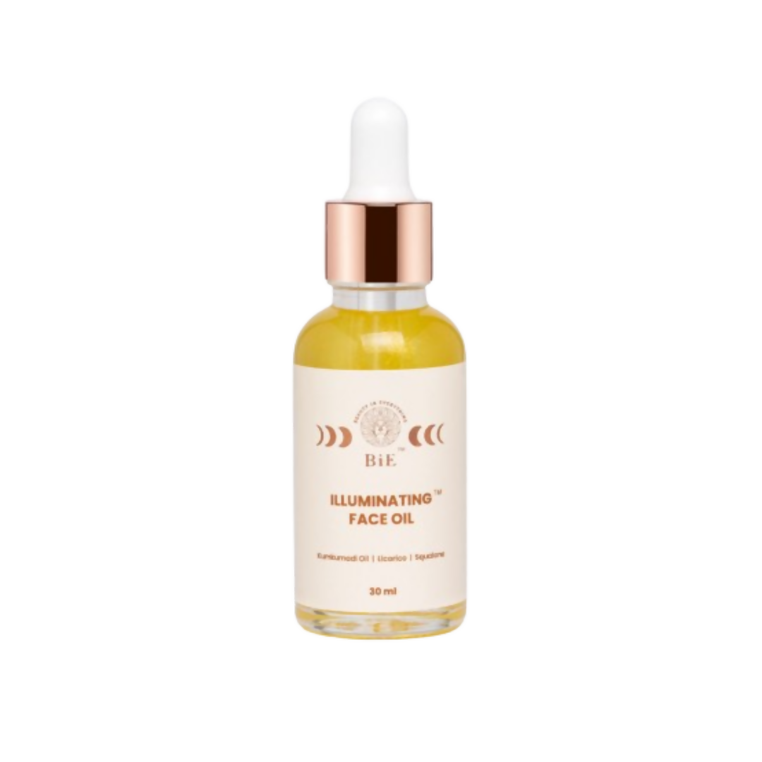 Bottle of illuminating face oil with dropper on a white background