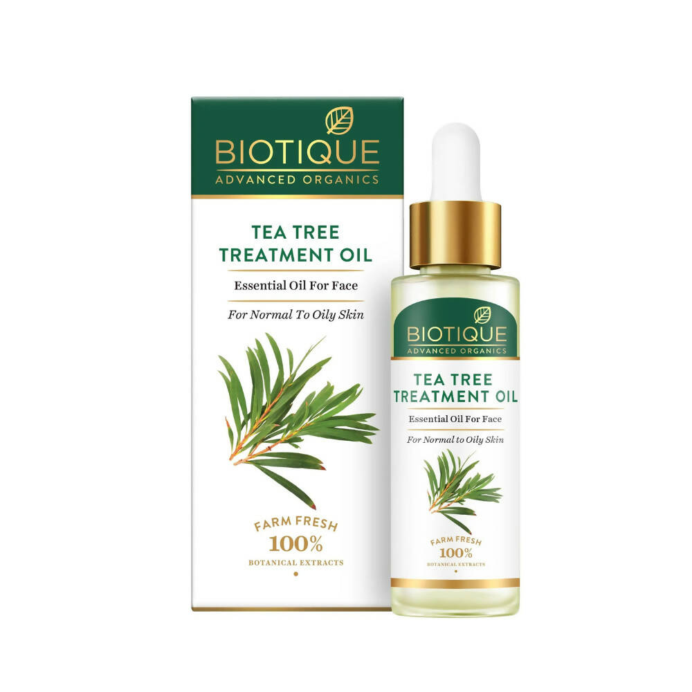 Biotique Tea Tree Treatment Oil with packaging on a white background