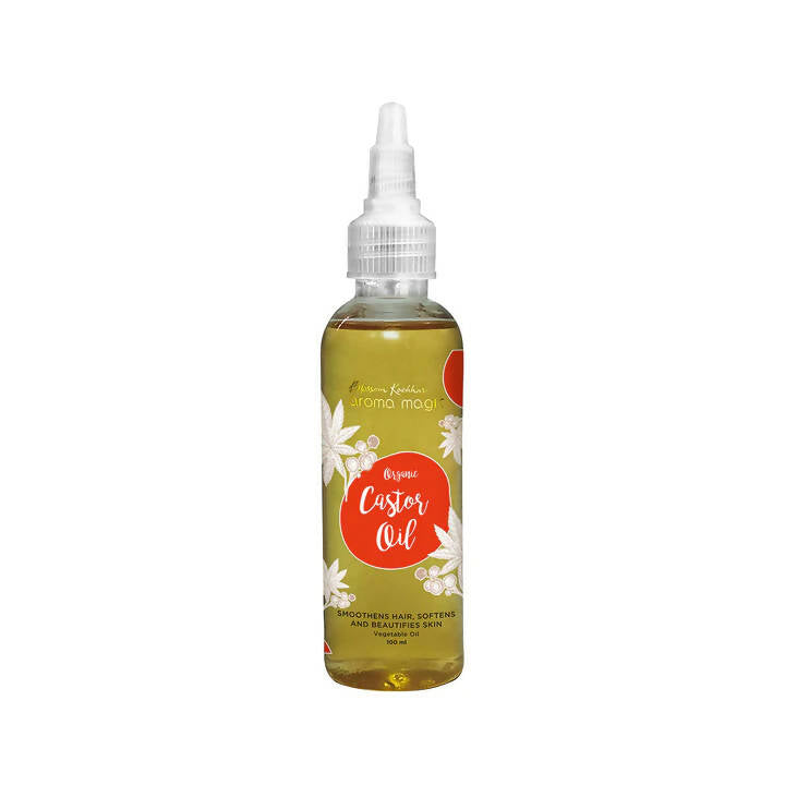 Bottle of castor oil with a white cap on a white background