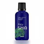 Blue bottle of 'Fairy Skin Oil' with black cap on a white background