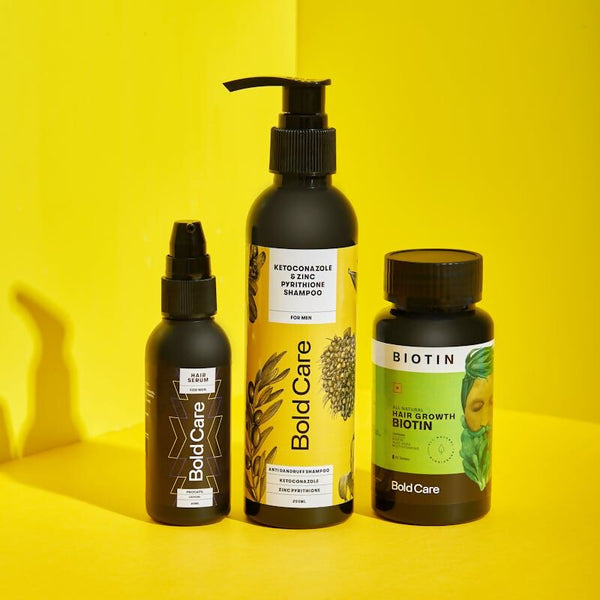 Three hair care products from Bold Care on a yellow background