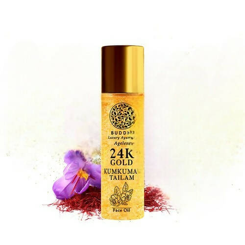 Buddha Luxury Ayurved 24K Gold Kumkuma Tailam bottle with flowers and saffron on a white background