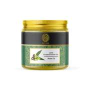 Jar of anti-pigmentation gel with a gold lid on a white background