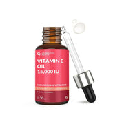 Vitamin E oil bottle with dropper on a white background