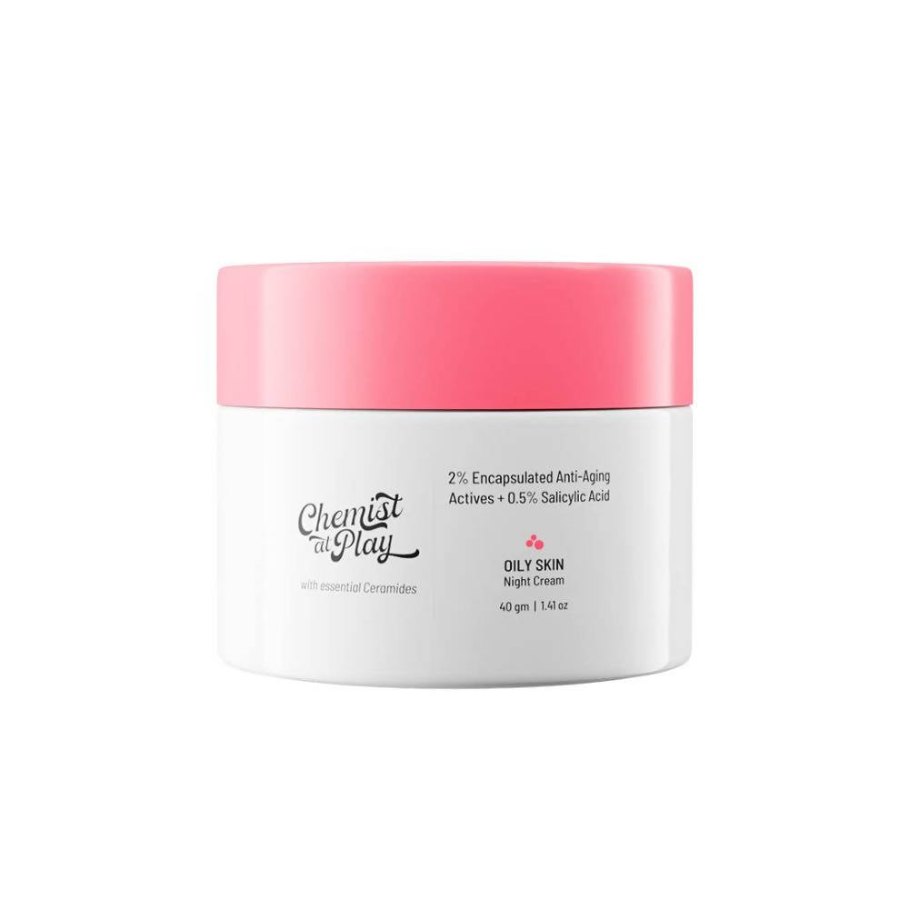 White jar with pink lid labeled 'Chemist at Play' on a white background