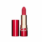 Red lipstick with gold cap on a white background