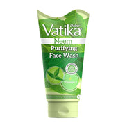 A tube of Dabur Vatika Neem Purifying Face Wash with green accents on packaging.