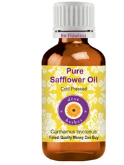 Bottle of pure safflower oil with a yellow label on a white background
