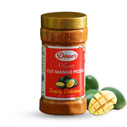 Jar of Dino's Organic Cut Mango Pickle with mangoes on a white background