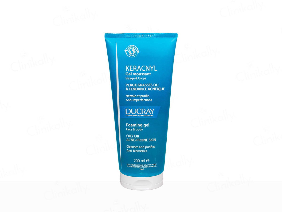 Blue tube of Kerachnyl foaming gel by Ducray on a white background