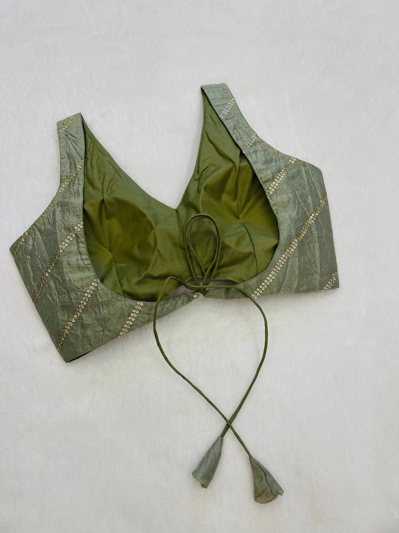 Divine light green organza festive wear backless blouse