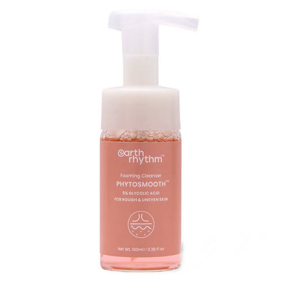 A pump bottle of Earth Rhythm Phyto Smooth Foaming Cleanser with a pinkish hue.