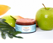 EVARAA fruit face mask jar with fruits and aloe vera leaves on a white background