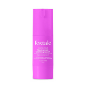 Pink bottle of foxtale Niacinamide Clarifying Serum on a white background