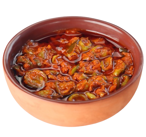 Bowl of spicy stew with peppers and tomatoes on a white background