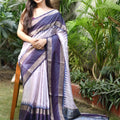 Gadwal Border Zari Chex Ikkat Print Saree