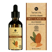 Bottle and packaging of herbal me certified organic sweet almond oil on a white background