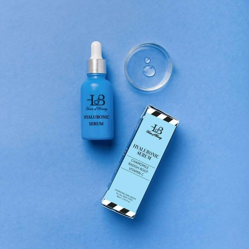 Hyaluronic serum bottle and packaging on a blue background