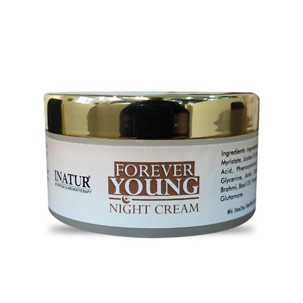 Jar of 'Forever Young Night Cream' with gold lid on a white background