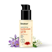 Inatur replenishing Kumkumadi moisturizer SPF-30 bottle with flowers on a white background