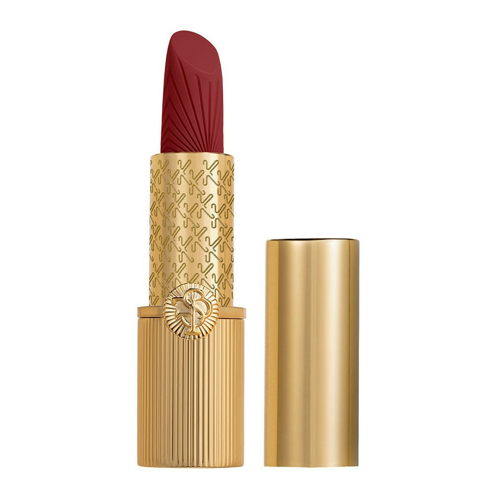 Red lipstick with gold casing on a white background