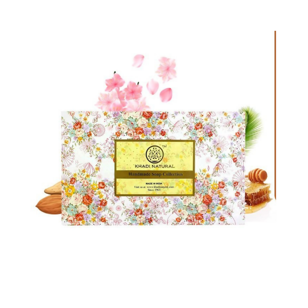 Khadi Natural handmade soap collection packaging with floral design and soap bars on a white background