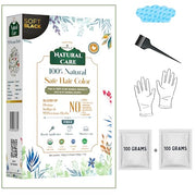 Natural Care hair color kit with packaging, gloves, brush, and packets on a white background